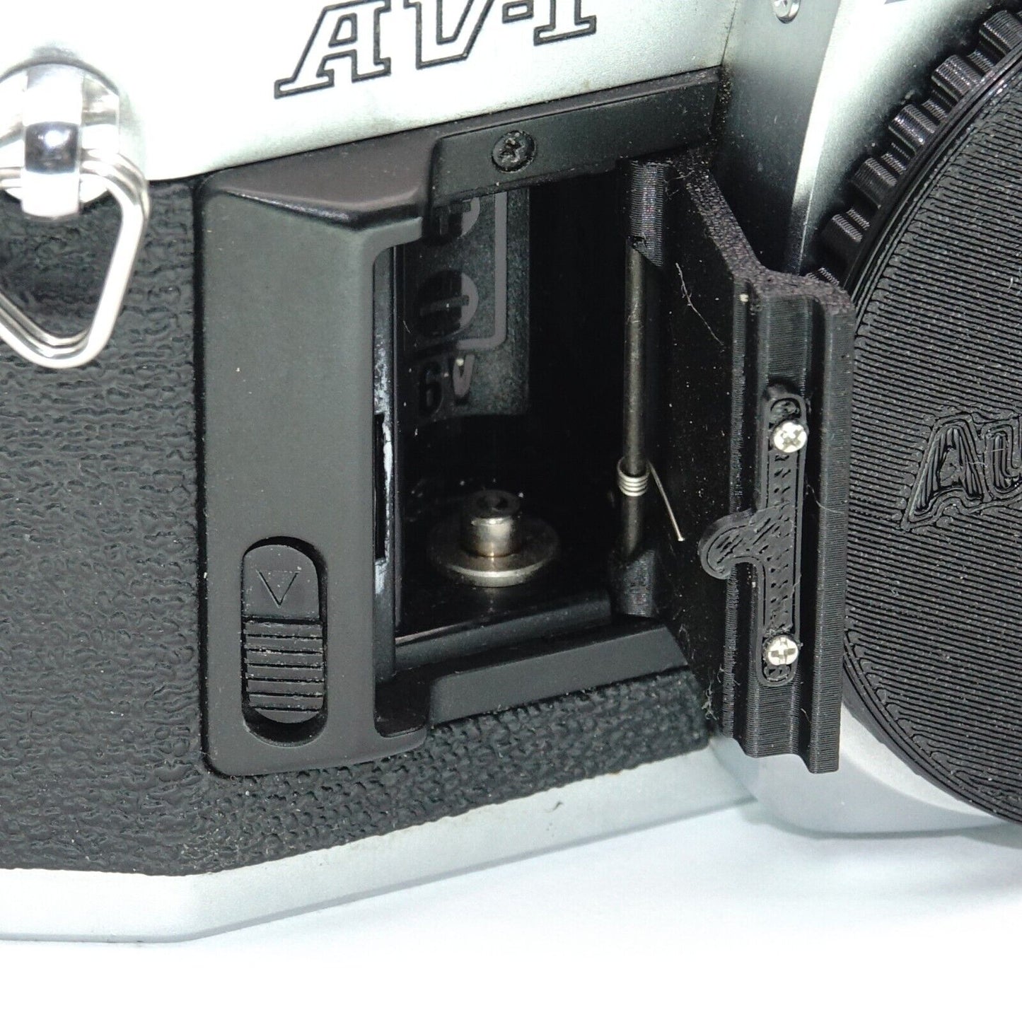 Battery compartment cover replacement for Canon AV-1