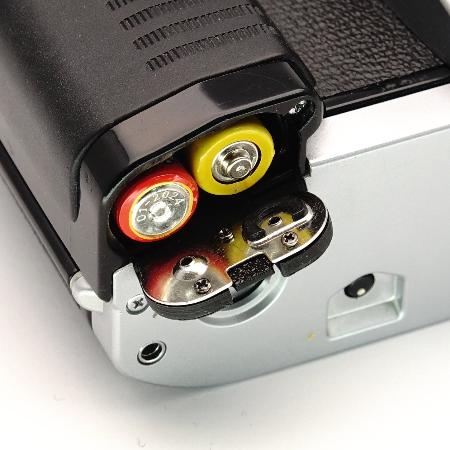 Replacement battery compartment cover for Canon AL-1